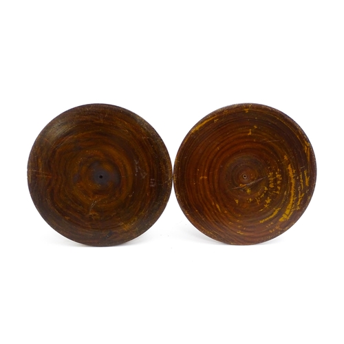 1100 - A pair of treen turned wooden candlesticks. Approx. 9 1/4