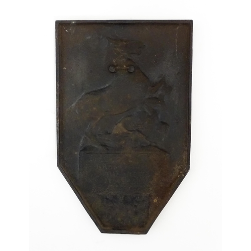 1105 - A 20thC cast plaque commemorating the King's German Legion with relief decoration depicting a rearin... 