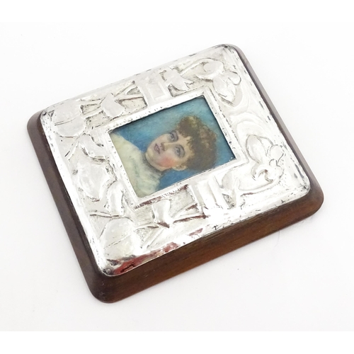 1163 - A late 19thC watercolour portrait miniature on celluloid with an Art Nouveau white metal surround an... 