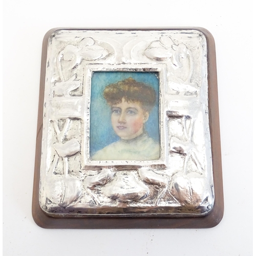 1163 - A late 19thC watercolour portrait miniature on celluloid with an Art Nouveau white metal surround an... 