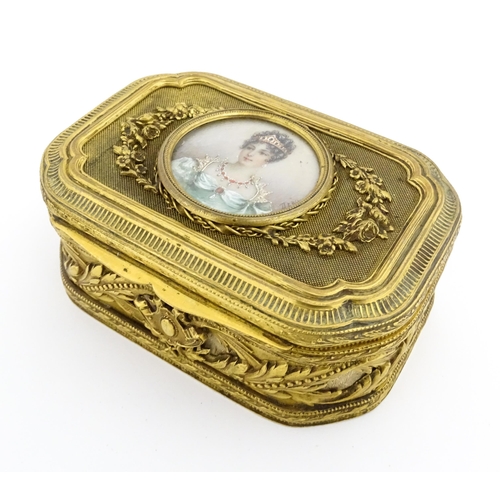 1207 - A Continental gilt metal jewellery box with banded foliate decoration, the lid with inset portrait m... 