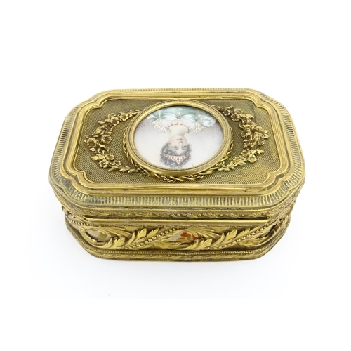 1207 - A Continental gilt metal jewellery box with banded foliate decoration, the lid with inset portrait m... 