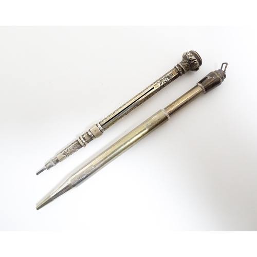 1218 - Two silver propelling pencils one with engraved acanthus scroll decoration and seal top marked .925 ... 