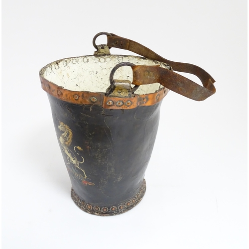 1272 - A 19thC leather fire bucket with Royal insignia / coat of arms with copper banding. Approx. 11 1/2