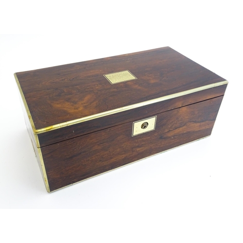 1284 - A 19thC brass bound rosewood writing box / slope with twin campaign style handles, single drawer und... 