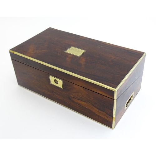 1284 - A 19thC brass bound rosewood writing box / slope with twin campaign style handles, single drawer und... 