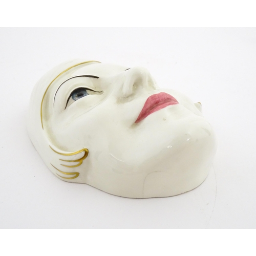 126 - A Royal Doulton wall mask modelled as Greta Garbo, model no. HN1594. Marked under. Approx. 7 3/4