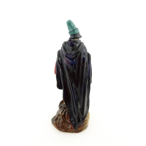 127 - A Royal Doulton figure The Pied Piper, model no. HN 2102. Marked under. Approx. 9