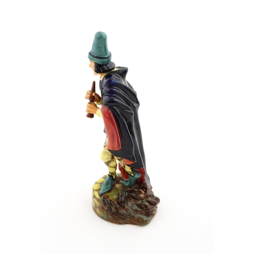 127 - A Royal Doulton figure The Pied Piper, model no. HN 2102. Marked under. Approx. 9