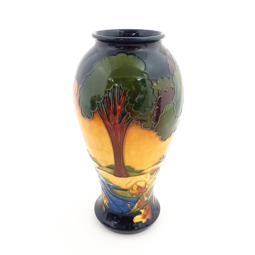 134 - A Moorcroft baluster vase decorated in the Evening Sky pattern, designed by Emma Bossons. Marked und... 