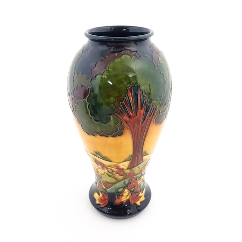 134 - A Moorcroft baluster vase decorated in the Evening Sky pattern, designed by Emma Bossons. Marked und... 