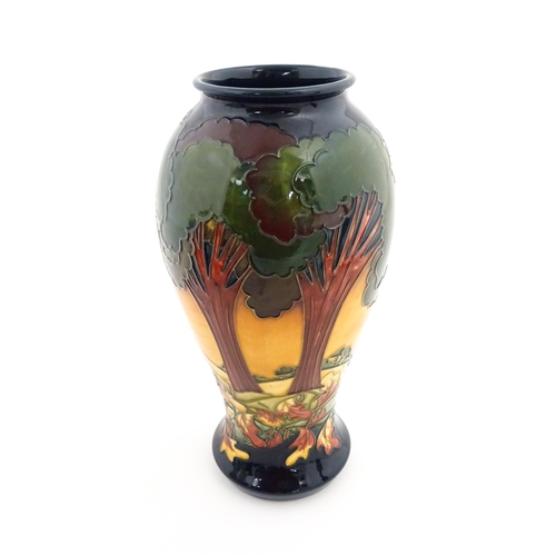 134 - A Moorcroft baluster vase decorated in the Evening Sky pattern, designed by Emma Bossons. Marked und... 