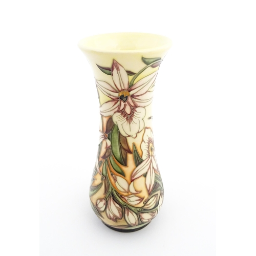 136 - A Moorcroft vase decorated in the Sunderland pattern designed by Shirley Hayes. Marked and signed un... 