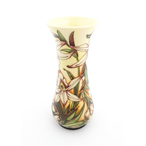 136 - A Moorcroft vase decorated in the Sunderland pattern designed by Shirley Hayes. Marked and signed un... 