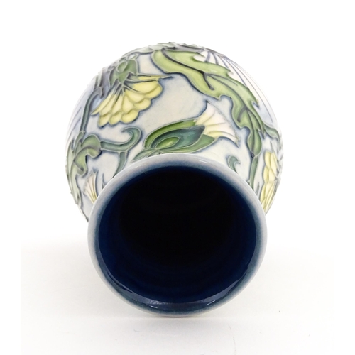 140 - A Moorcroft vase of squat form decorated in the Rough Hawksbeard pattern designed by Rachel Bishop. ... 