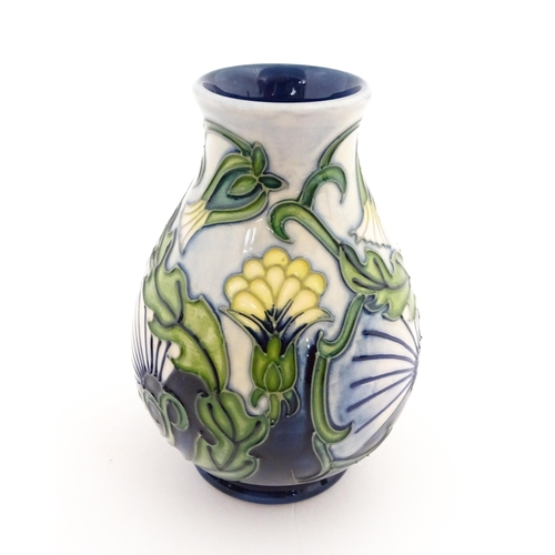 140 - A Moorcroft vase of squat form decorated in the Rough Hawksbeard pattern designed by Rachel Bishop. ... 