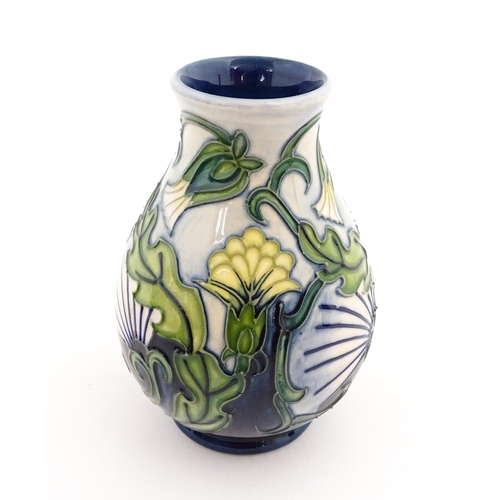 140 - A Moorcroft vase of squat form decorated in the Rough Hawksbeard pattern designed by Rachel Bishop. ... 