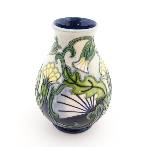 140 - A Moorcroft vase of squat form decorated in the Rough Hawksbeard pattern designed by Rachel Bishop. ... 