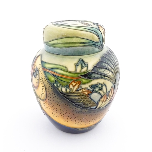 144 - A Moorcroft ginger jar decorated in the Trout pattern with fish detail. Marked under with makers mar... 