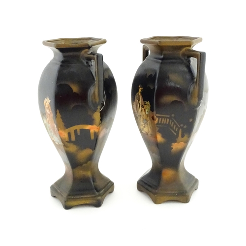 154 - A pair of twin handled vases of hexagonal form with Japanese Geisha decoration. Approx. 12