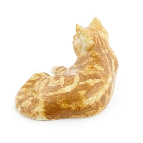 156 - A large Winstanley model of a recumbent ginger cat, size 7. Marked under. Approx. 13 1/2