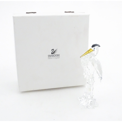 228 - A Swarovski crystal model of a heron.  Approx. 5 3/4