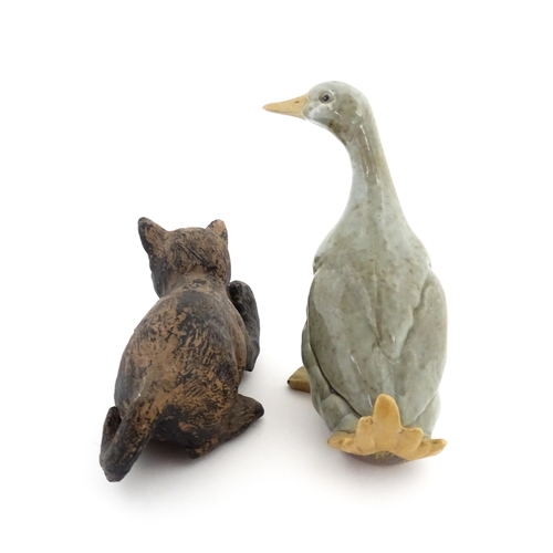 163 - A Chinese model of a duck with a celadon style glaze. Together with a Bretby model of a kitten / cat... 