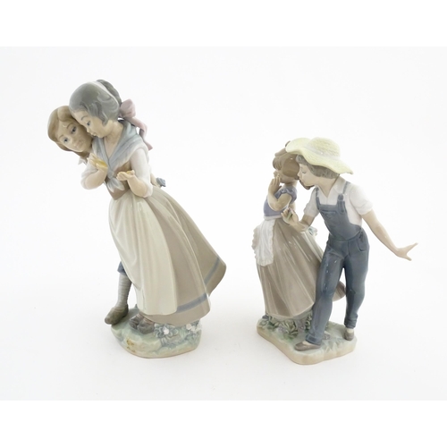 182 - Two Lladro figure groups comprising Children with fruits model no. 4931, and Love in Bloom no. 5292.... 