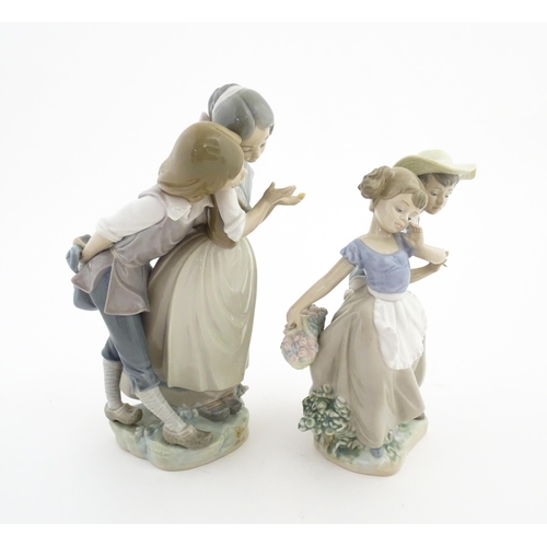 182 - Two Lladro figure groups comprising Children with fruits model no. 4931, and Love in Bloom no. 5292.... 