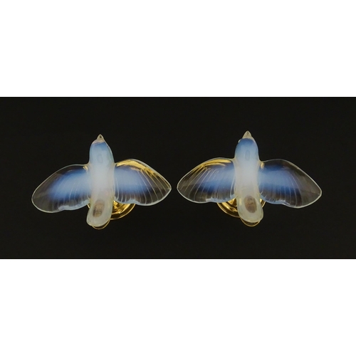 211 - A pair of glass models of swallows raised on French silver gilt stands, stamped Odiot. Approx. 2 1/4... 