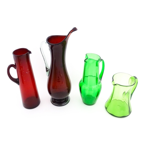 262A - Eight assorted mid century glass jugs / pitchers, to include lemonade jugs, water jugs and a Whitefr... 