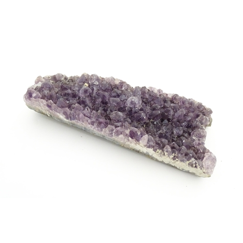 1078 - Natural History / Geology Interest: An amethyst hardstone specimen geode. Approx. 7 1/4