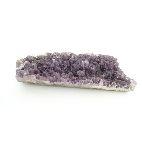 1078 - Natural History / Geology Interest: An amethyst hardstone specimen geode. Approx. 7 1/4