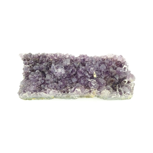 1078 - Natural History / Geology Interest: An amethyst hardstone specimen geode. Approx. 7 1/4