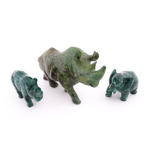 1122 - Ethnographic / Native / Tribal : Two 20thC carved malachite style animals comprising a rhino and an ... 