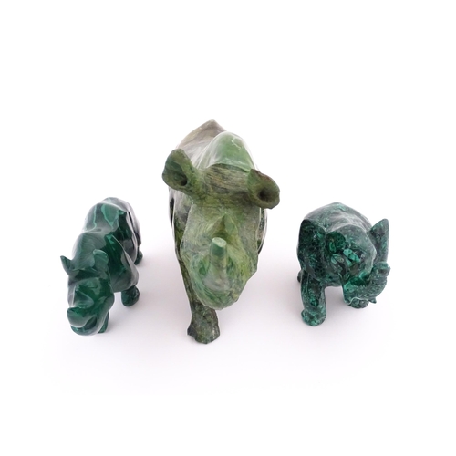 1122 - Ethnographic / Native / Tribal : Two 20thC carved malachite style animals comprising a rhino and an ... 