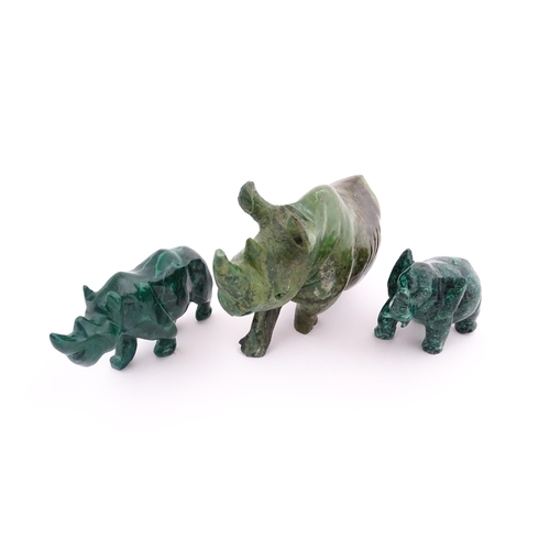 1122 - Ethnographic / Native / Tribal : Two 20thC carved malachite style animals comprising a rhino and an ... 