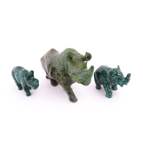 1122 - Ethnographic / Native / Tribal : Two 20thC carved malachite style animals comprising a rhino and an ... 