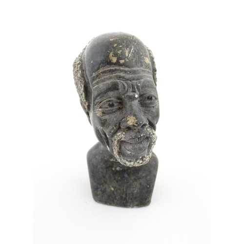 1131 - Ethnographic / Native / Tribal : An African soapstone carving modelled as the head of a bearded man.... 