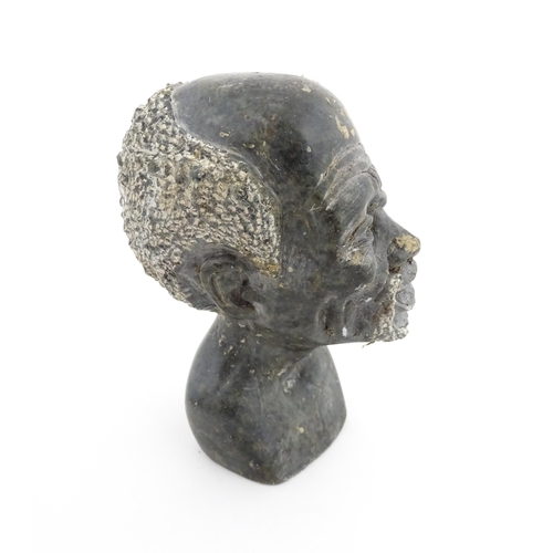 1131 - Ethnographic / Native / Tribal : An African soapstone carving modelled as the head of a bearded man.... 