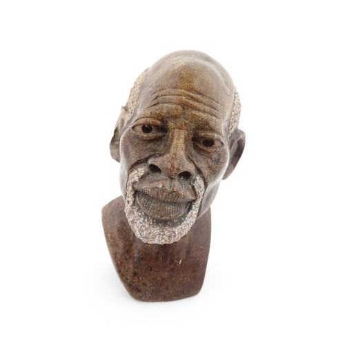 1132 - Ethnographic / Native / Tribal : An African soapstone carving modelled as the head of a bearded man.... 