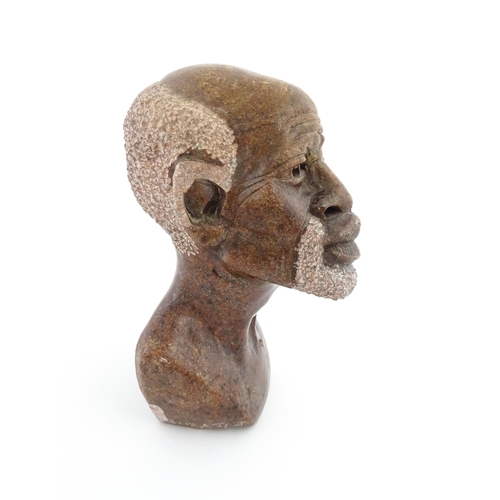 1132 - Ethnographic / Native / Tribal : An African soapstone carving modelled as the head of a bearded man.... 