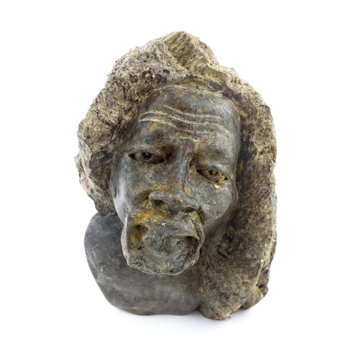 1137 - Ethnographic / Native / Tribal : An African carved soapstone bust modelled as a man with dreadlocks.... 