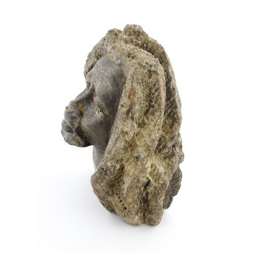 1137 - Ethnographic / Native / Tribal : An African carved soapstone bust modelled as a man with dreadlocks.... 