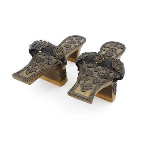 1139 - A pair of 19thC Turkish / Ottoman carved wooden sandals / shoes with applied filigree style decorati... 