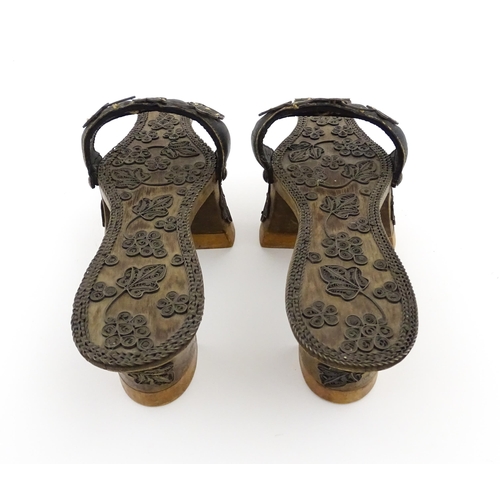 1139 - A pair of 19thC Turkish / Ottoman carved wooden sandals / shoes with applied filigree style decorati... 