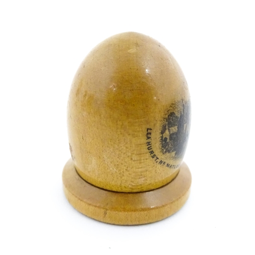 1151 - A 19thC Mauchline ware sewing thimble case of dome form with a vignette depicting Lea Hurst, Near Ma... 