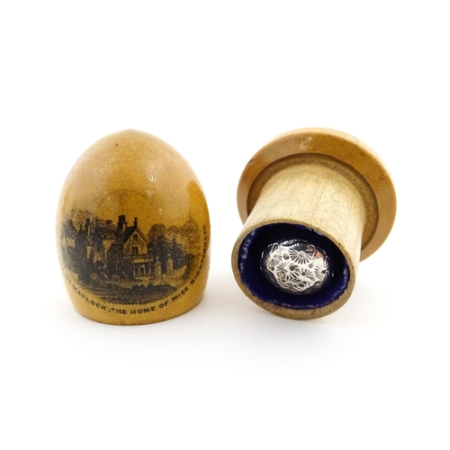 1151 - A 19thC Mauchline ware sewing thimble case of dome form with a vignette depicting Lea Hurst, Near Ma... 