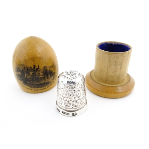 1151 - A 19thC Mauchline ware sewing thimble case of dome form with a vignette depicting Lea Hurst, Near Ma... 