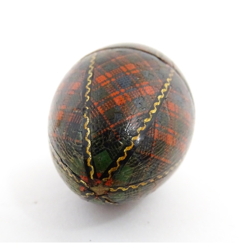 1154 - A 19thC Tartan ware sewing thimble case of egg form, titled McDonald. Approx. 2